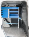 04_Syncroblock mit Spanngurten an der Laderaumtrennwand des Caddy