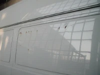Verbeulter Kleintransporter